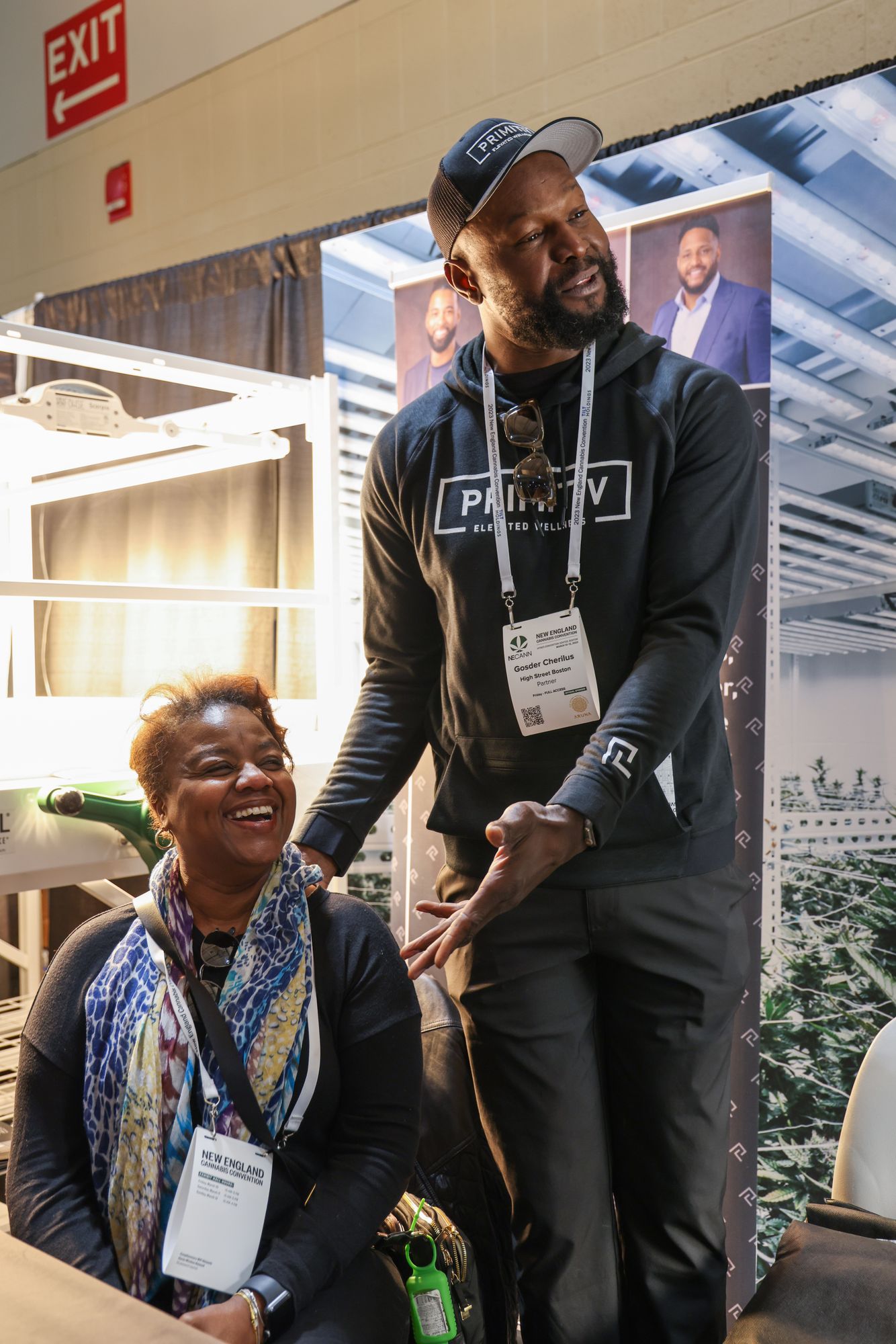Gosder Cherilus greeting a guest at an industry event