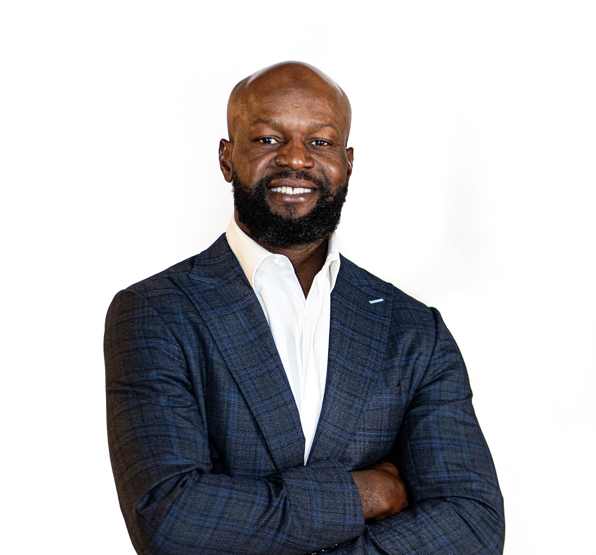 Gosder Cherilus in a blue plaid blazer